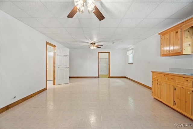 3786 Donavon Mill Ct, Powhatan, VA 23139 - unfurnished living room featuring ceiling fan, a paneled ceiling, and baseboards