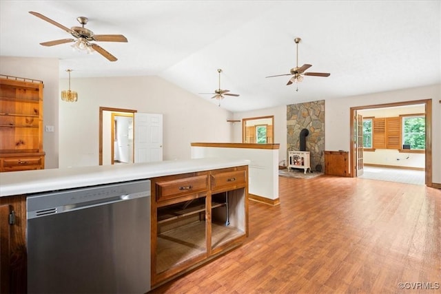 3786 Donavon Mill Ct, Powhatan, VA 23139 - kitchen featuring dishwasher, a wood stove, a ceiling fan, light wood-style flooring, and lofted ceiling