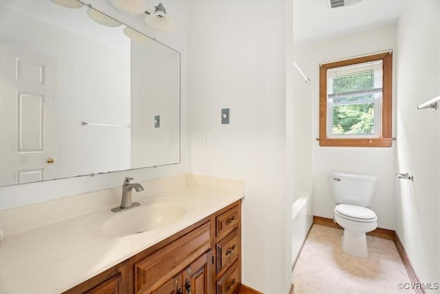 3786 Donavon Mill Ct, Powhatan, VA 23139 - bathroom with vanity, toilet, baseboards, marble finish floors, and bathing tub / shower combination