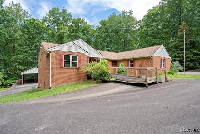 3786 Donavon Mill Ct, Powhatan, VA 23139 - ranch-style home with brick siding, a deck, and asphalt driveway