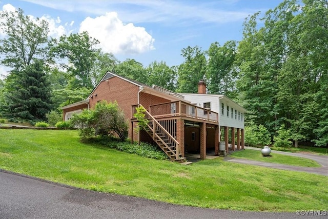 3786 Donavon Mill Ct, Powhatan, VA 23139 - view of side of home with stairway, a deck, asphalt driveway, and a yard