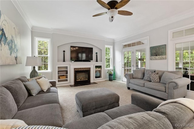 11601 Shadow Run Ln, Glen Allen, VA 23059 - carpeted living area featuring ornamental molding, ceiling fan, plenty of natural light, and a high end fireplace