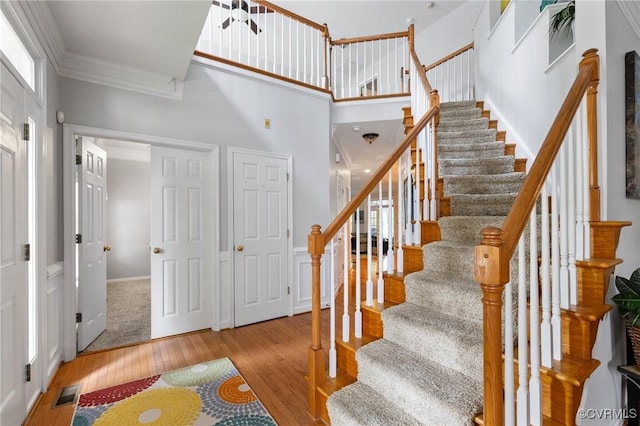 11601 Shadow Run Ln, Glen Allen, VA 23059 - staircase featuring hardwood / wood-style flooring and crown molding