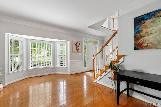 11601 Shadow Run Ln, Glen Allen, VA 23059 - entrance foyer featuring crown molding, stairway, wood finished floors, and baseboards