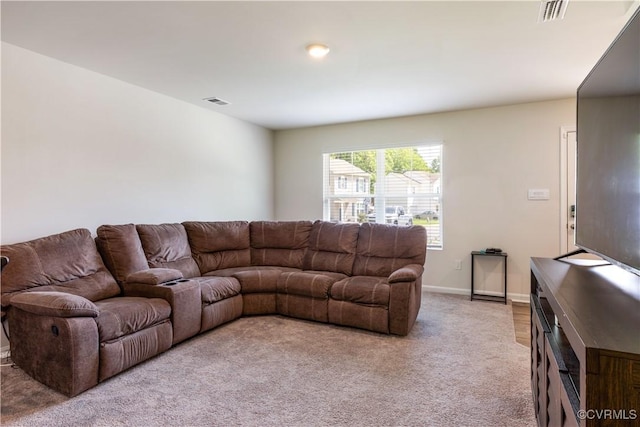 3612 Roselawn Ter, Hopewell, VA 23860 - living room featuring light colored carpet and baseboards