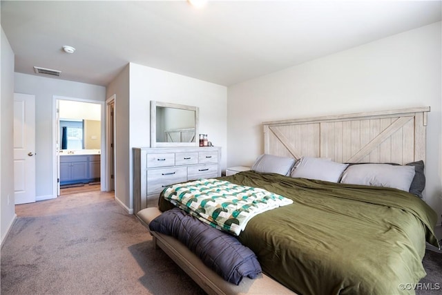 3612 Roselawn Ter, Hopewell, VA 23860 - carpeted bedroom featuring baseboards and ensuite bathroom