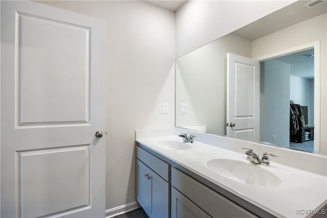 3612 Roselawn Ter, Hopewell, VA 23860 - bathroom with double vanity and baseboards