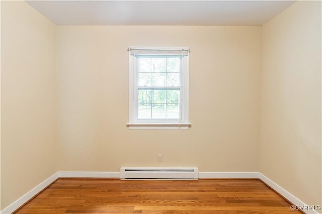 5441 Claridge Dr, Chesterfield, VA 23832 - spare room with a baseboard radiator, light wood-style flooring, and baseboards