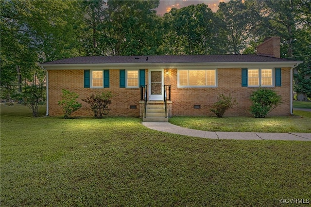 5441 Claridge Dr, Chesterfield, VA 23832 - ranch-style home with a front yard, a chimney, and brick siding