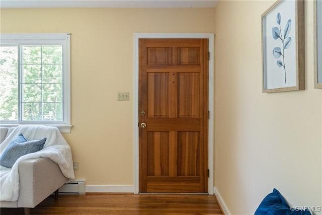 5441 Claridge Dr, Chesterfield, VA 23832 - foyer entrance featuring wood finished floors, plenty of natural light, and baseboard heating