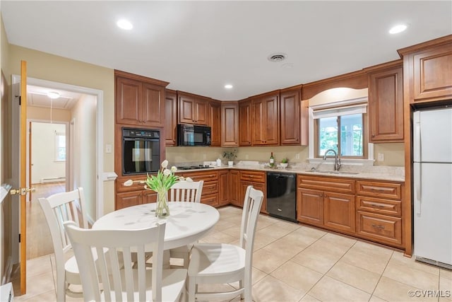 5441 Claridge Dr, Chesterfield, VA 23832 - kitchen featuring black appliances, a sink, light countertops, recessed lighting, and light tile patterned flooring