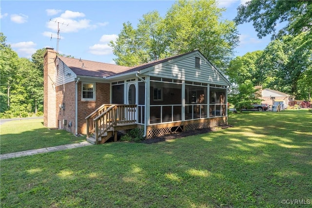 5441 Claridge Dr, Chesterfield, VA 23832 - rear view of property with a sunroom, a yard, a chimney, and brick siding