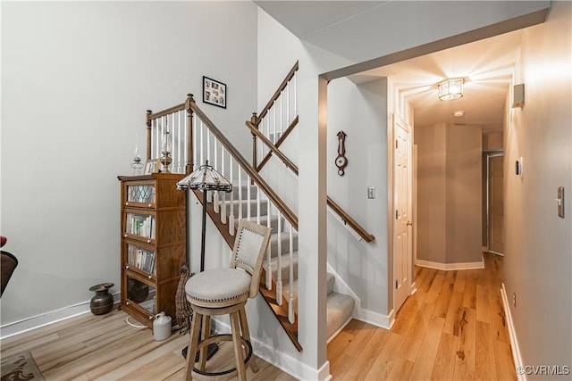 3909 Foxfield Ter, Henrico, VA 23233 - staircase featuring wood finished floors and baseboards
