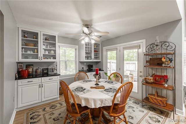 3909 Foxfield Ter, Henrico, VA 23233 - dining space with healthy amount of natural light, light wood-type flooring, ceiling fan, and baseboards