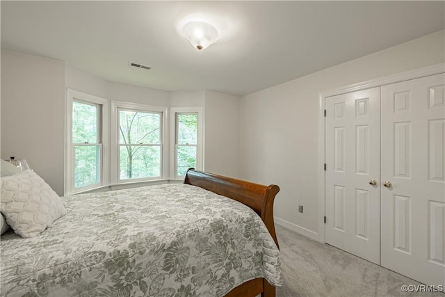 3909 Foxfield Ter, Henrico, VA 23233 - bedroom with light carpet, baseboards, and a closet