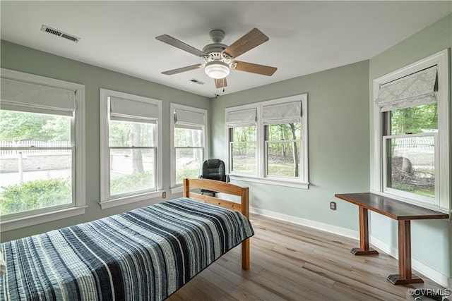 3909 Foxfield Ter, Henrico, VA 23233 - bedroom with wood finished floors, baseboards, and a ceiling fan