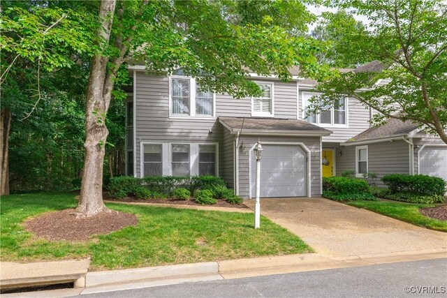 3909 Foxfield Ter, Henrico, VA 23233 - view of front of house featuring a garage, driveway, and a front yard