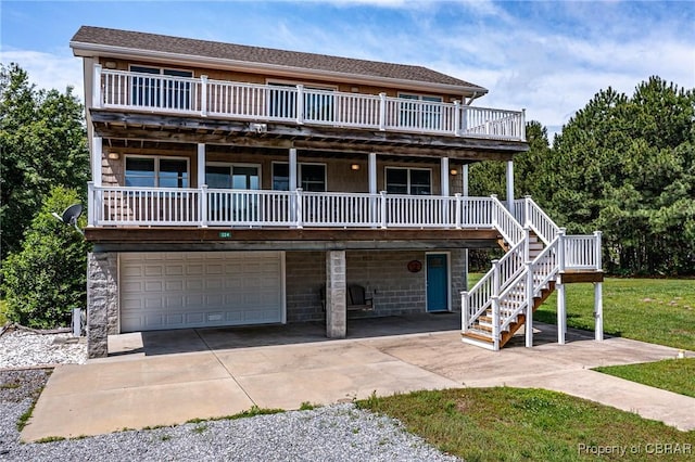 224 Oyster Creek Dr, White Stone, VA 22578 - view of front property with an attached garage, driveway, and stairs