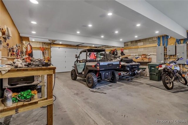 224 Oyster Creek Dr, White Stone, VA 22578 - garage with a workshop area, electric panel, and recessed lighting