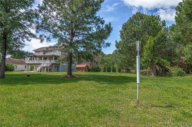 224 Oyster Creek Dr, White Stone, VA 22578 - view of grassy yard featuring stairway and a wooden deck