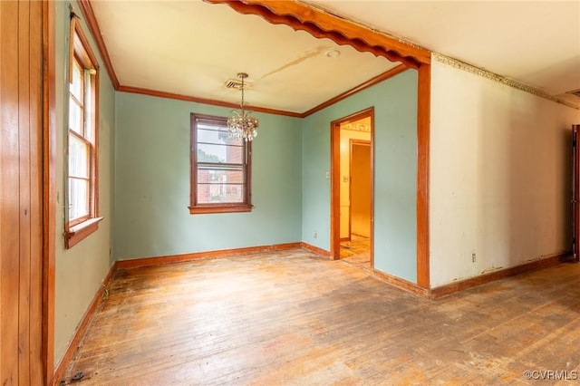 4 W Jerald St, Henrico, VA 23075 - spare room featuring hardwood / wood-style flooring, plenty of natural light, a chandelier, and ornamental molding