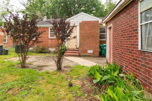 4 W Jerald St, Henrico, VA 23075 - property entrance featuring brick siding and central air condition unit