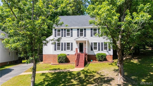 3206 Ramsey Dr, Chester, VA 23831 - colonial house with crawl space, a front yard, and asphalt driveway