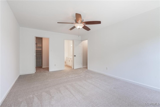 3206 Ramsey Dr, Chester, VA 23831 - unfurnished bedroom with a walk in closet, baseboards, light colored carpet, and a closet
