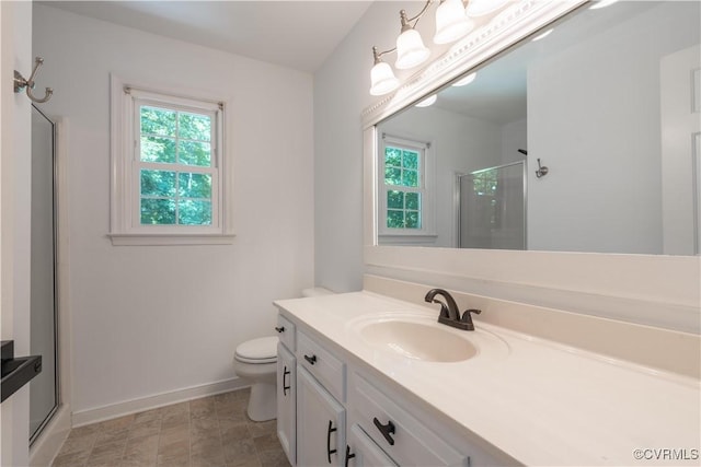 3206 Ramsey Dr, Chester, VA 23831 - full bathroom with a shower with shower door, baseboards, vanity, and toilet