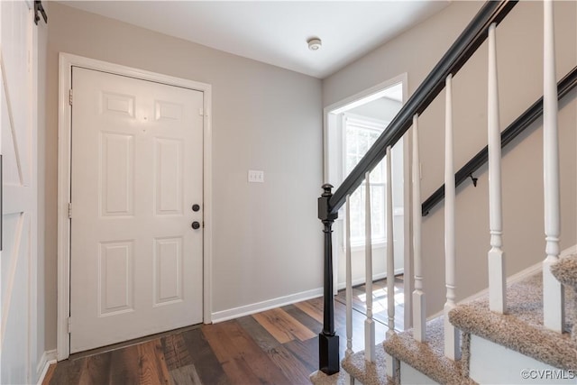 3206 Ramsey Dr, Chester, VA 23831 - entryway featuring stairs, dark wood-type flooring, and baseboards