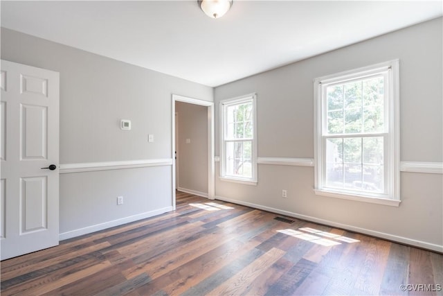 3206 Ramsey Dr, Chester, VA 23831 - spare room with wood finished floors and baseboards