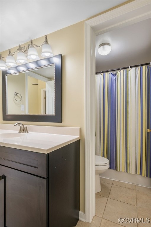 2615 Towngate Ct, Henrico, VA 23233 - bathroom featuring tile patterned flooring, toilet, vanity, and a shower with shower curtain