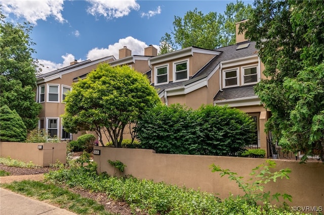 2615 Towngate Ct, Henrico, VA 23233 - view of front of property with a chimney and stucco siding
