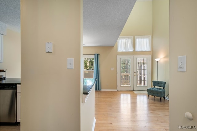 2615 Towngate Ct, Henrico, VA 23233 - entrance foyer featuring light wood-type flooring, a textured ceiling, french doors, and a high ceiling