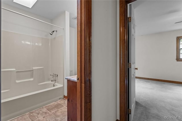 325 Hamlet Rd, Manakin Sabot, VA 23103 - bathroom featuring bathtub / shower combination, vanity, and a skylight