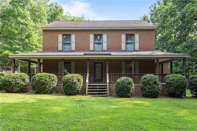 325 Hamlet Rd, Manakin Sabot, VA 23103 - view of front of home featuring a chimney, a front lawn, a porch, and brick siding
