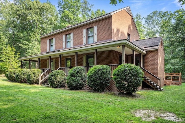 325 Hamlet Rd, Manakin Sabot, VA 23103 - view of front facade featuring stairway, brick siding, a front lawn, and covered porch