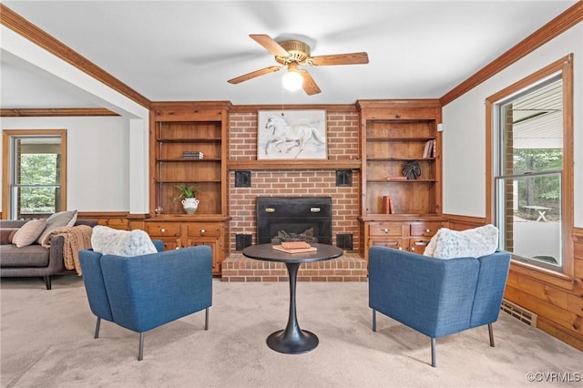 325 Hamlet Rd, Manakin Sabot, VA 23103 - living room featuring ornamental molding, built in features, light colored carpet, ceiling fan, and a wainscoted wall