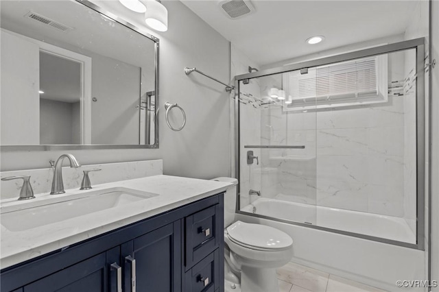 2920 Hawthorne Ave, Richmond, VA 23222 - full bathroom featuring vanity, toilet, shower / bath combination with glass door, and recessed lighting