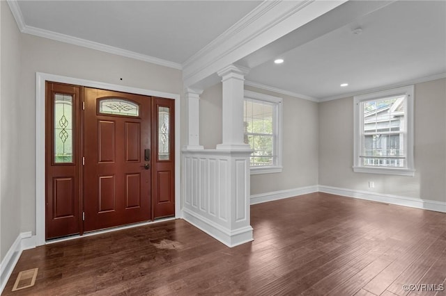 2920 Hawthorne Ave, Richmond, VA 23222 - foyer entrance with decorative columns, dark wood-style flooring, plenty of natural light, ornamental molding, and recessed lighting