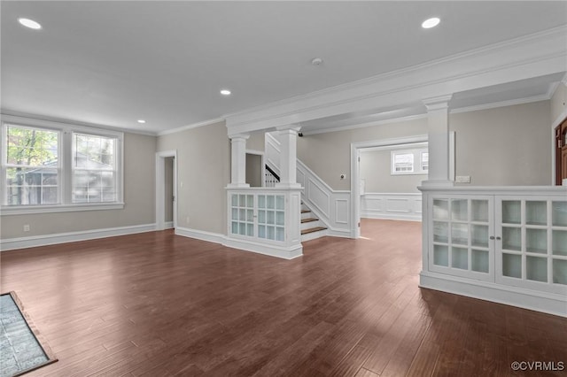 2920 Hawthorne Ave, Richmond, VA 23222 - unfurnished room featuring decorative columns, ornamental molding, wood finished floors, stairway, and recessed lighting