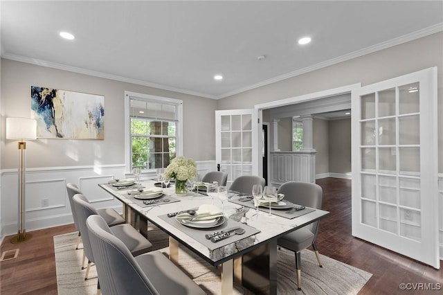 2920 Hawthorne Ave, Richmond, VA 23222 - dining space featuring wainscoting, wood finished floors, ornamental molding, recessed lighting, and decorative columns