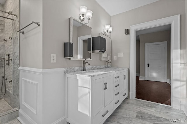 2920 Hawthorne Ave, Richmond, VA 23222 - full bath with a tile shower, double vanity, and marble finish flooring