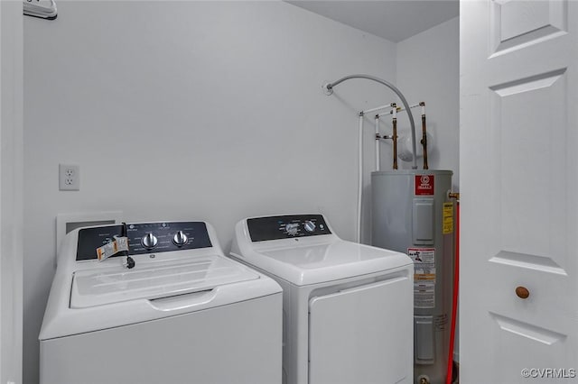 327 White Sand Dr, Heathsville, VA 22473 - washroom featuring water heater and washer and dryer