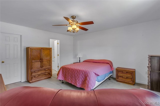 327 White Sand Dr, Heathsville, VA 22473 - bedroom with carpet floors, ceiling fan, connected bathroom, and baseboards