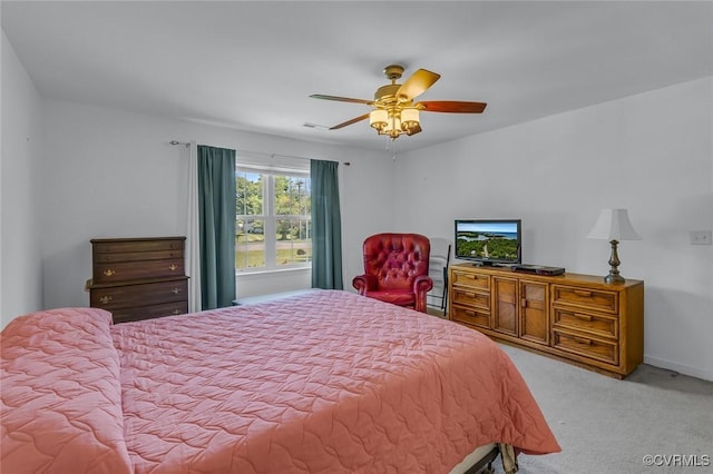 327 White Sand Dr, Heathsville, VA 22473 - bedroom featuring light carpet, ceiling fan, and baseboards