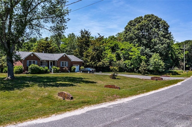 327 White Sand Dr, Heathsville, VA 22473 - view of front facade with a front lawn and a garage