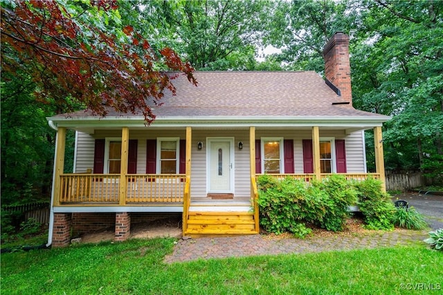 13100 Spring Trace Pl, Midlothian, VA 23112 - view of front of property featuring a porch, a chimney, and roof with shingles