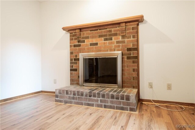13100 Spring Trace Pl, Midlothian, VA 23112 - detailed view of wood finished floors and a brick fireplace