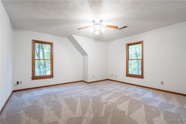 13100 Spring Trace Pl, Midlothian, VA 23112 - additional living space featuring light colored carpet, a ceiling fan, and a textured ceiling